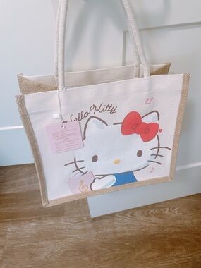 Sanrio Hello Kitty Cream Tote with Red Bow and Blue Accent